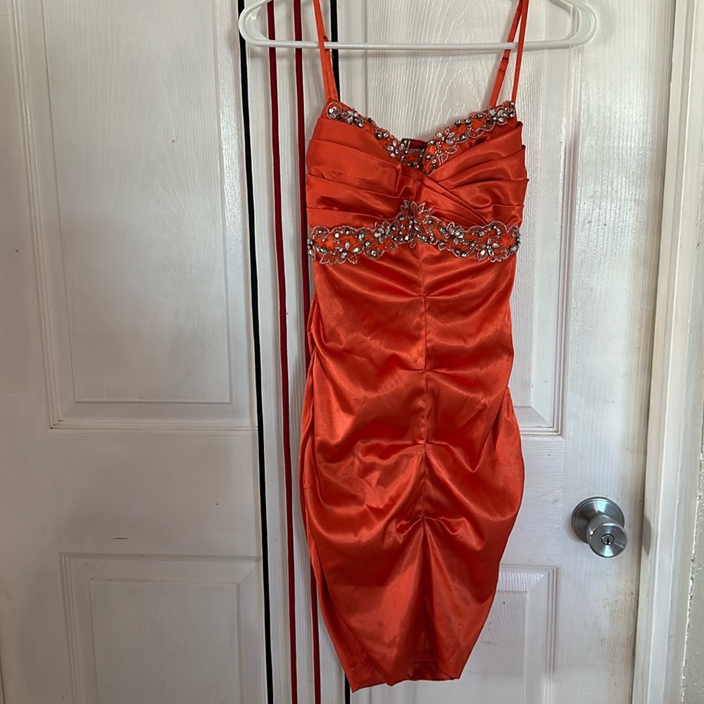 Woman’s orange mini dress size 5/6